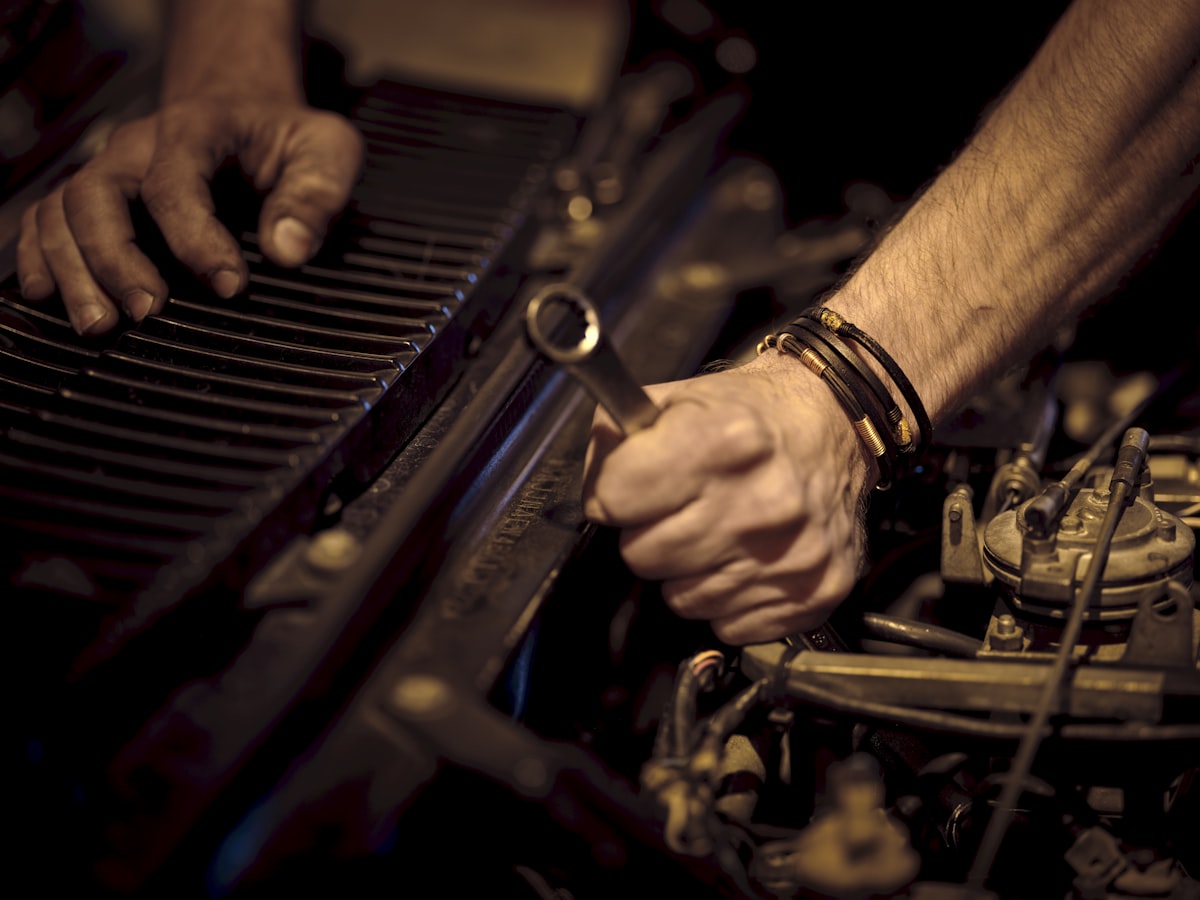 A technician working in Vector Auto's modern service bay